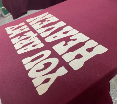 a white screen printing design of text that reads 